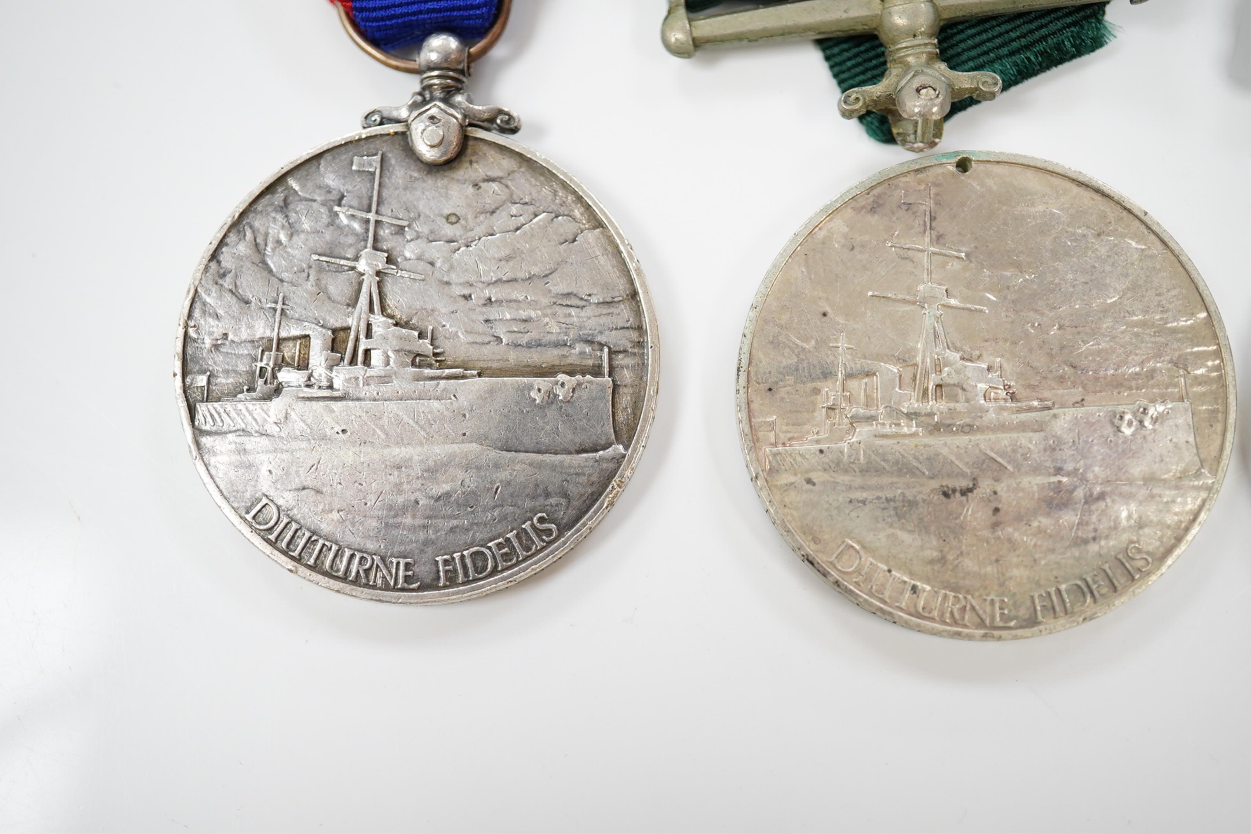 Four assorted Naval service medals; EVII Royal Naval Reserve LSGC to V.440. W.Lewis, STO.RNR.; GV Royal Fleet Reserve LSGC unnamed; GV RNLSGC (renamed) to J,87119 R.S. J.West. A.B.H.M.S.Victory; GV RNRLSGC to 1361V W.H.J